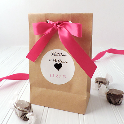 Kraft sack favors embellished with ribbons and seals