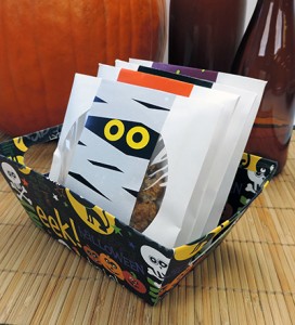 Use CD sleeves and printable labels to make unique Halloween treats