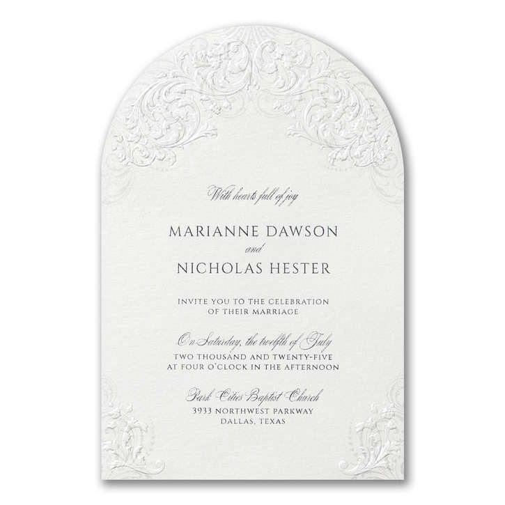 Arch shaped wedding invitation featuring an embossed filigree design