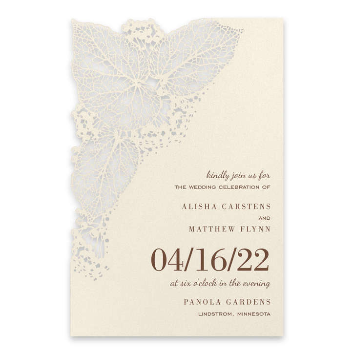 Contemporary laser cut wedding invitation with an intricate leaf design