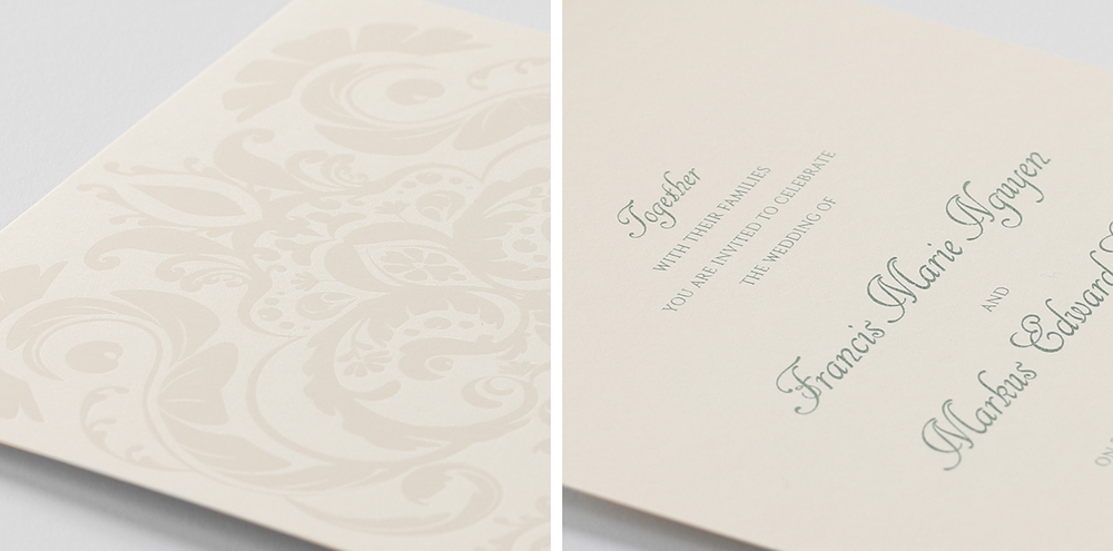 A floral motif stamped in pearl foil decorates the back of a luxurious wedding invitation