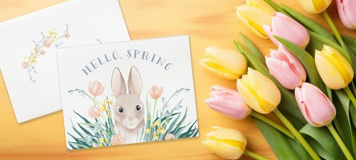 Cute all-occasion greeting card with artwork featuring a rabbit sitting in spring flowers