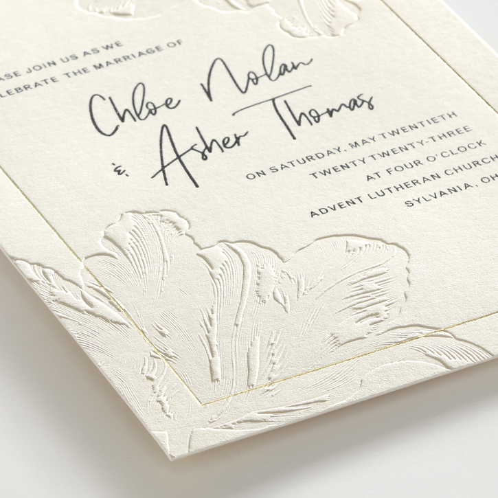 Contemporary wedding invitation featuring a debossed floral design.