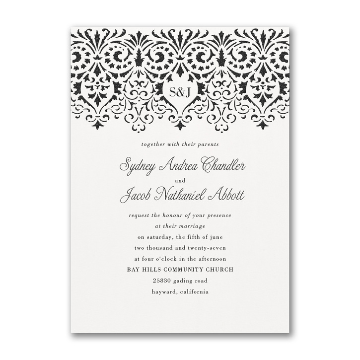 Wedding invitation featuring wording and a boho-chic border printed in raised thermography ink.