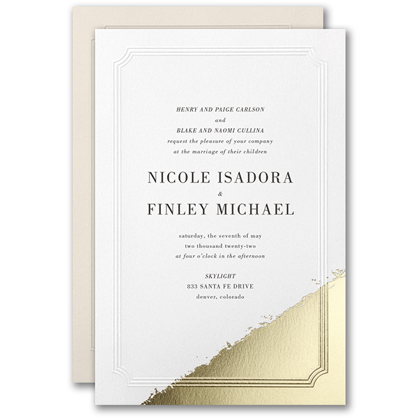 A non-traditional wedding invitation with foil corner that looks as if "dipped" in gold. 