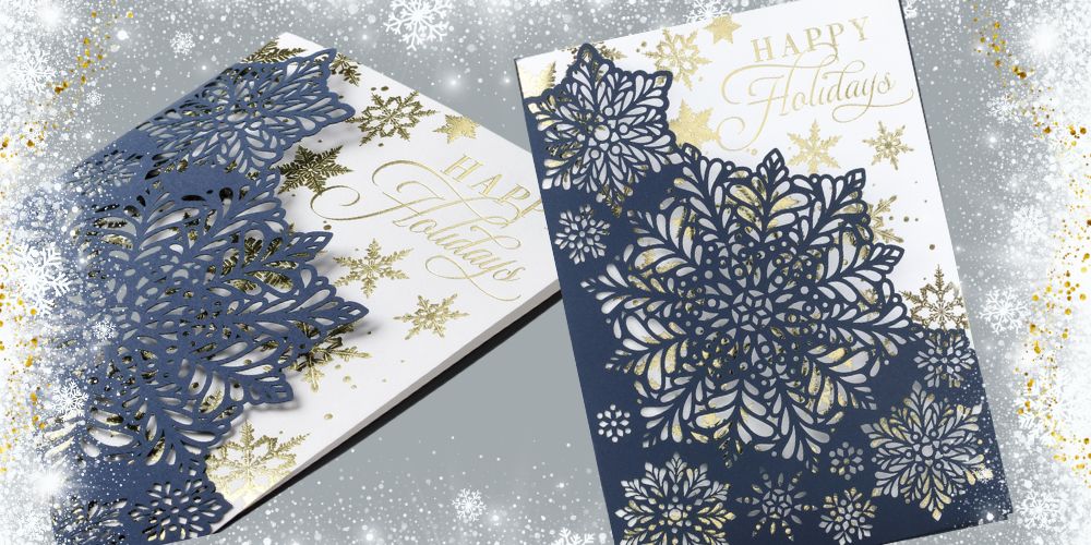 Unique holiday cards with laser cut pocket and gold foil snowflake card.